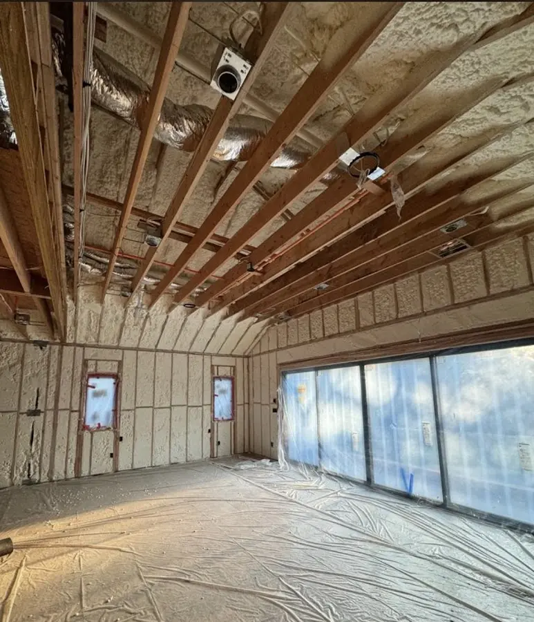 Interior walls and ceiling insulated with spray foam during new construction in Evergreen